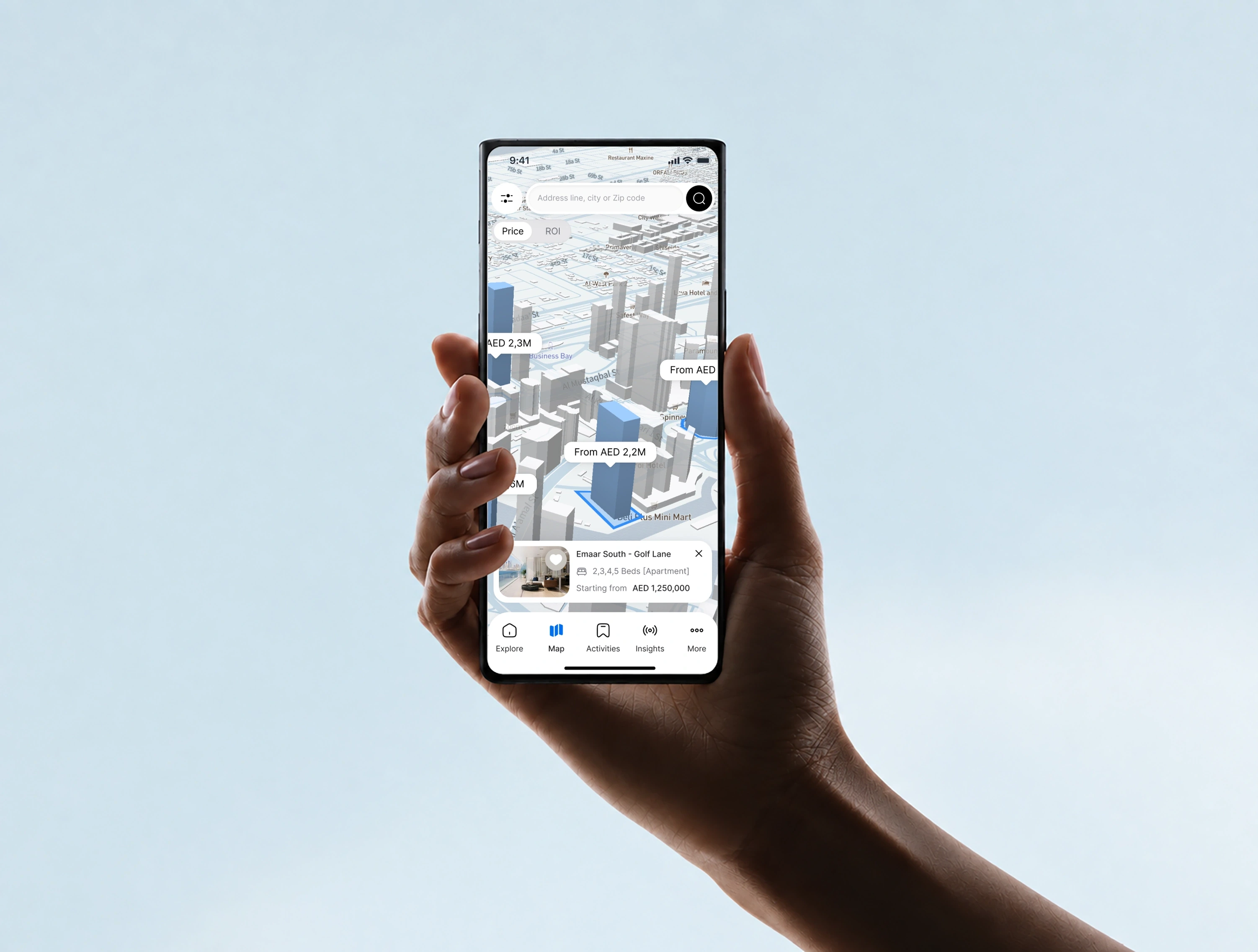Homzly property map on a phone held against a light-blue background