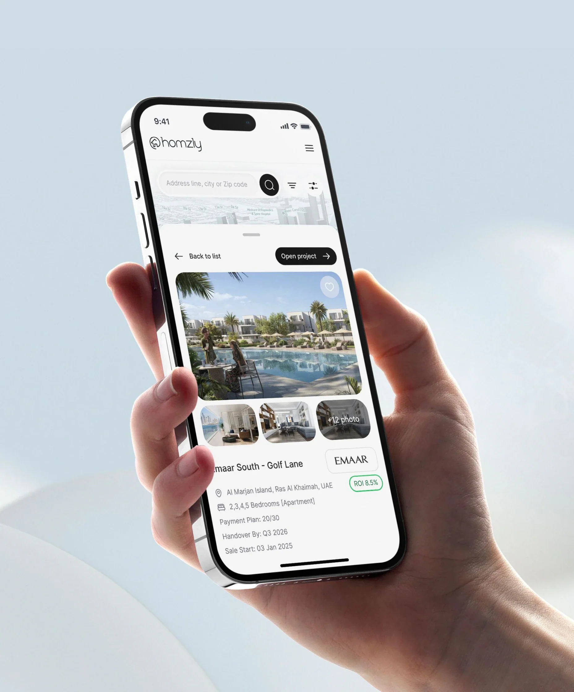 Homzly real-estate marketplace shown on a phone
